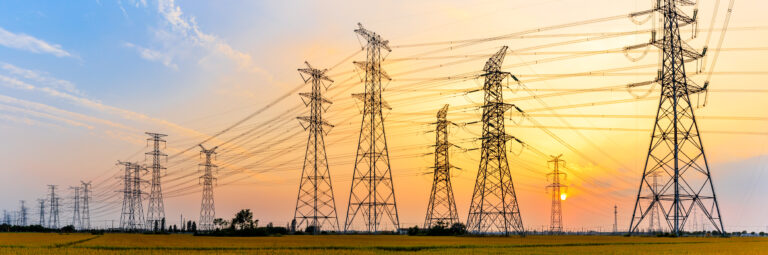 High-voltage,Power,Lines,At,Sunset,high,Voltage,Electric,Transmission,Tower