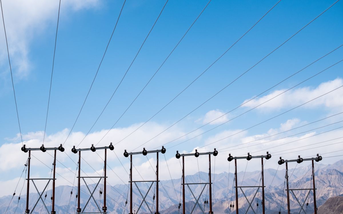 Electric poles and cables with blue sky background in Ladakh city India