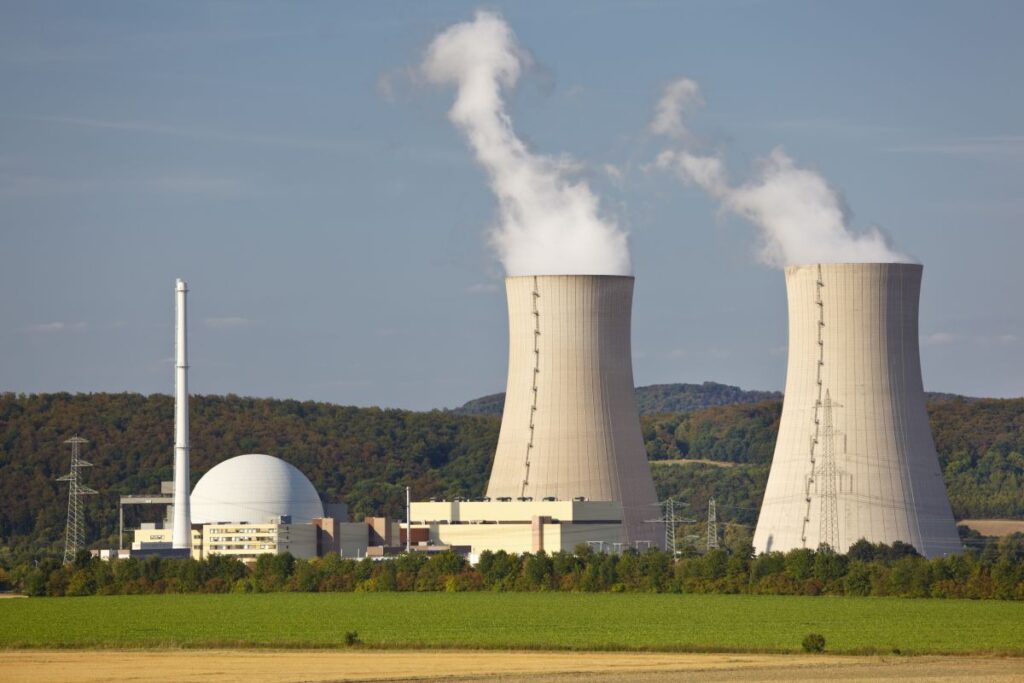 Nuclear Power Station In Green Landscape small modular reactors present on power plant image