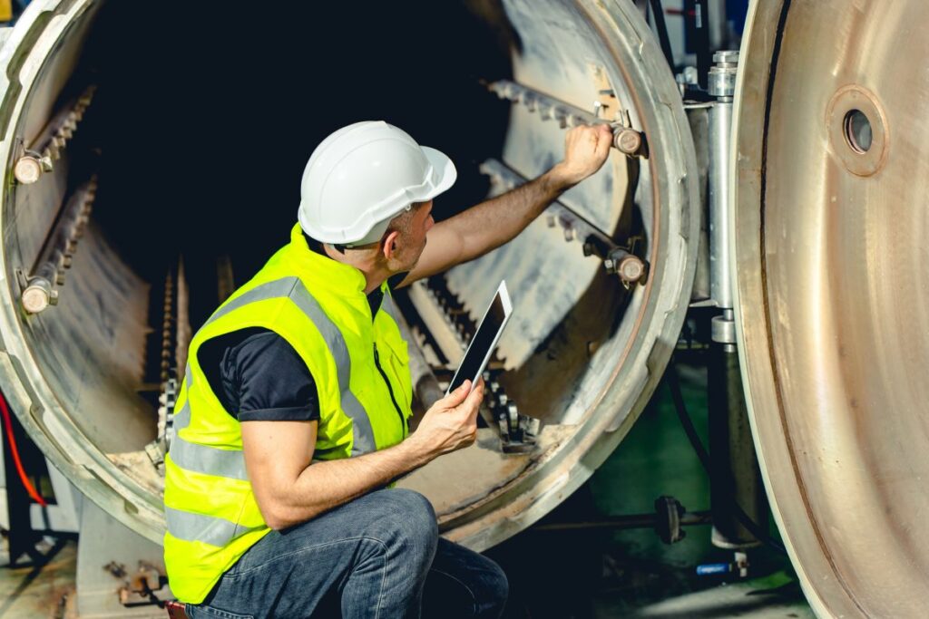engineer work service checking and maintenance industry boiler in heavy factory Predictive maintenance