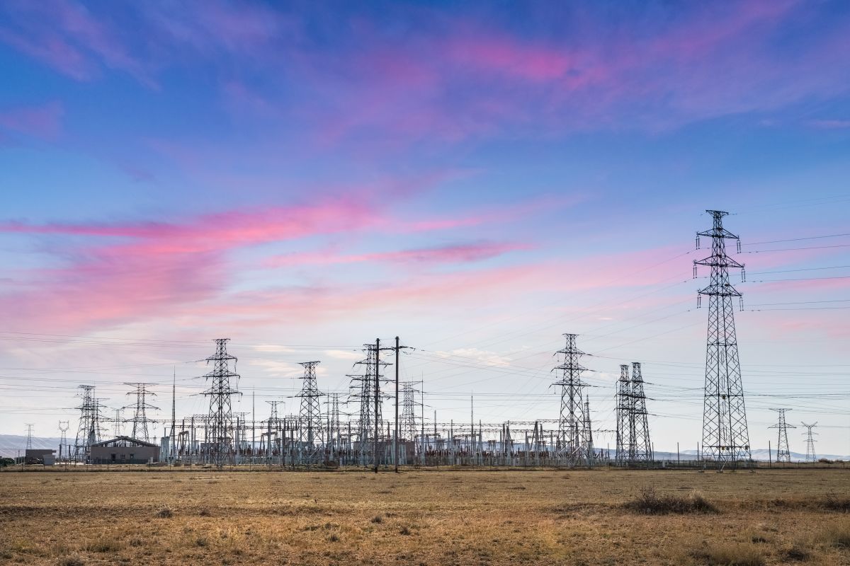electric substation with sunset glow electric energy Infrastructure substation with sunset glow