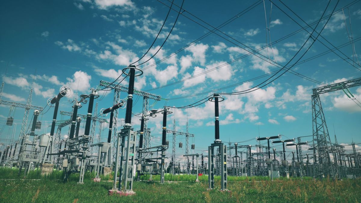 Power Grid Station Electrical Distribution Station Transformers High-voltage Lines In Sunny Summer Day