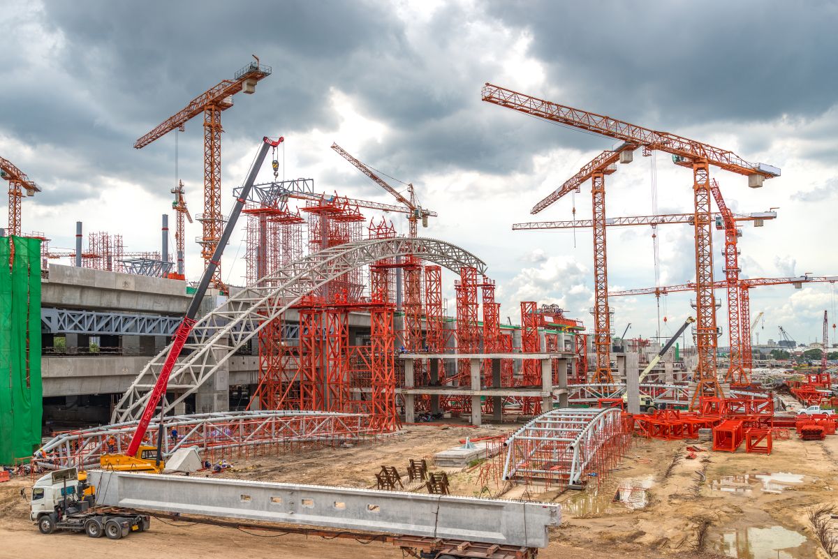 Construction Cranes Working on Expressway and Skytrain Site in A
